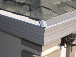 corner of seamless gutter system complete with gutter guard